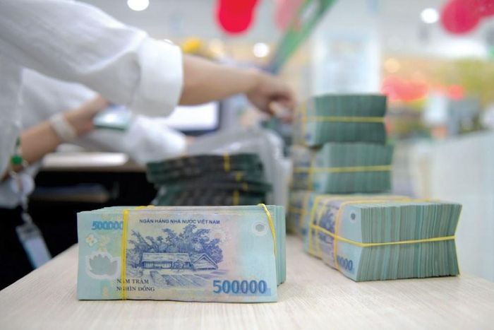  Tiền gửi của người dân vẫn "chảy" vào hệ thống ngân hàng. 